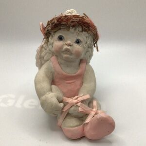 Adorable Baby Angel Figurine with Pink Details